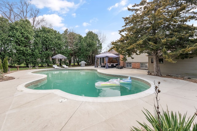 pool featuring a patio area