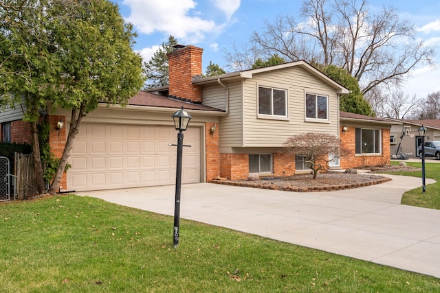 tri-level home featuring a chimney, concrete driveway, a front yard, and brick siding