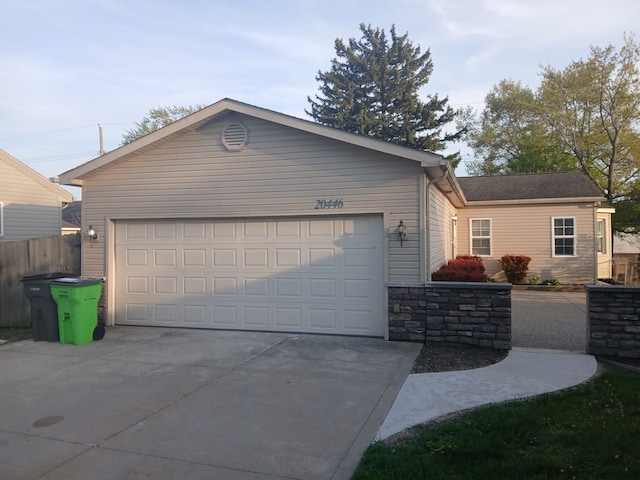 20446 Williamson St, Clinton Township, MI 48035 - view of front of house with concrete driveway and an attached garage