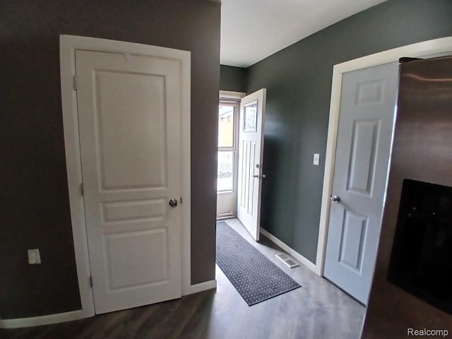20446 Williamson St, Clinton Township, MI 48035 - entryway featuring dark wood-style flooring and baseboards