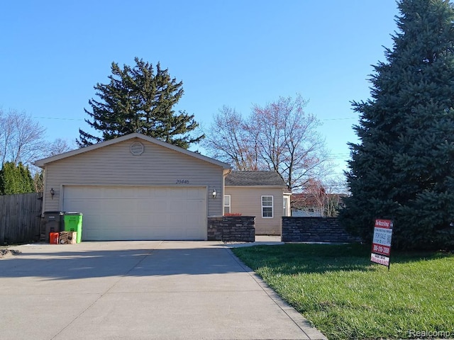 20446 Williamson St, Clinton Township, MI 48035 - ranch-style house featuring concrete driveway and an attached garage