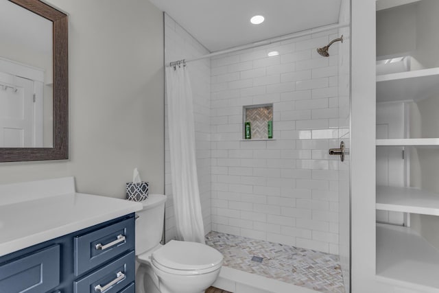 full bath with toilet, recessed lighting, a shower stall, and vanity