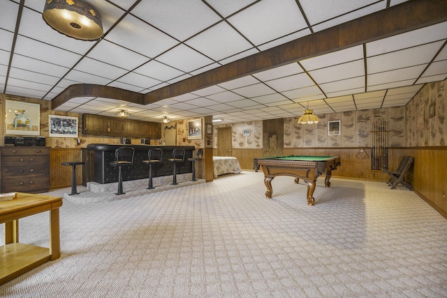 52473 Sheridan Rd, Paw Paw, MI 49079 - playroom with carpet floors, a drop ceiling, wood walls, pool table, and bar