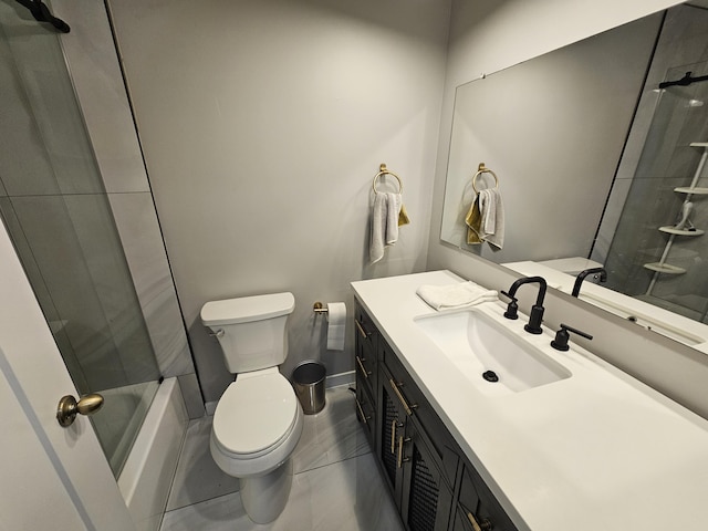 full bath with vanity, baseboards, and toilet