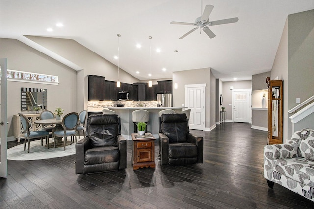 living room featuring high vaulted ceiling, ceiling fan, baseboards, and dark wood finished floors