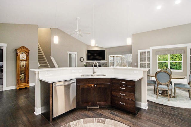 kitchen featuring ceiling fan, dishwasher, a sink, light countertops, and open floor plan