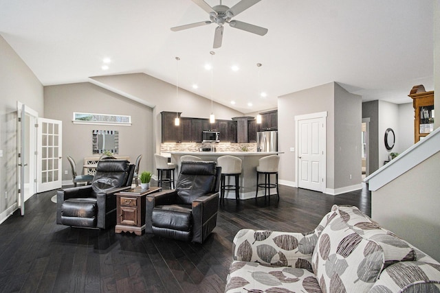 living area featuring baseboards, ceiling fan, dark wood finished floors, recessed lighting, and vaulted ceiling