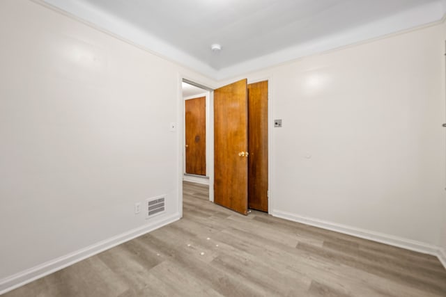 9233 Mckinney St, Detroit, MI 48224 - empty room with visible vents, baseboards, and wood finished floors