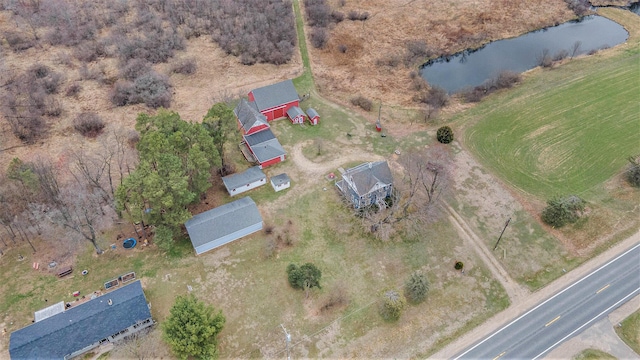 aerial view with a rural view and a water view