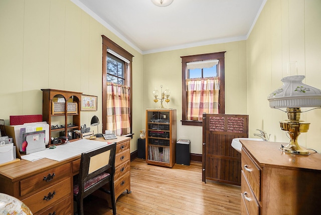 office area featuring ornamental molding and light wood finished floors