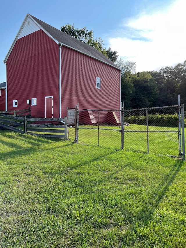 view of outbuilding with fence