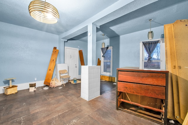 basement with a textured ceiling