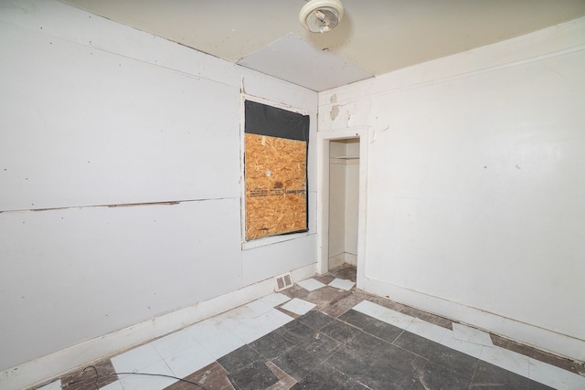 13057 Chelsea St, Detroit, MI 48213 - empty room with tile patterned floors and visible vents