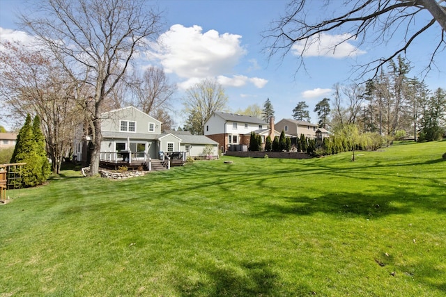 view of yard with a deck