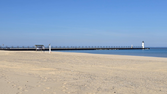 property view of water featuring a view of the beach