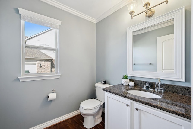 54210 Birchwood Dr, South Lyon, MI 48178 - bathroom with toilet, baseboards, vanity, crown molding, and wood finished floors