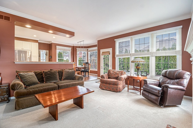 living area featuring recessed lighting, crown molding, visible vents, baseboards, and light colored carpet