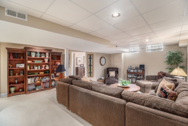living room featuring recessed lighting, visible vents, a drop ceiling, and light colored carpet
