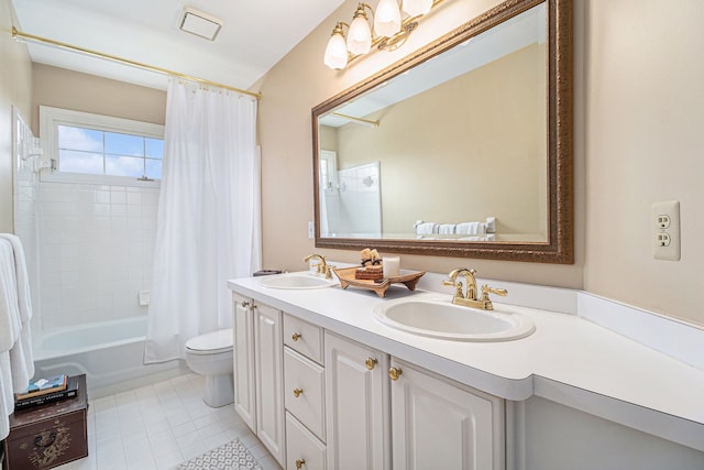 full bath with double vanity, toilet, tile patterned flooring, and a sink