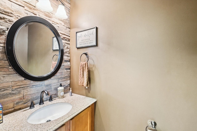 bathroom with vanity and backsplash