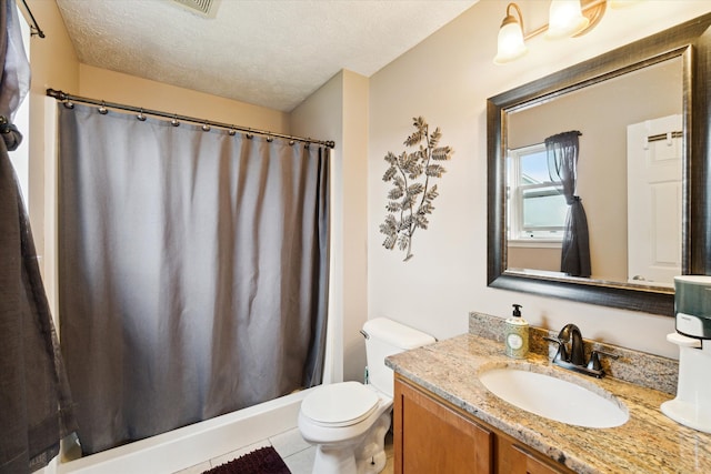 full bath featuring vanity, toilet, tile patterned floors, a textured ceiling, and a shower with curtain