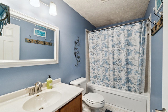 bathroom featuring toilet, a textured ceiling, shower / bath combo, and vanity
