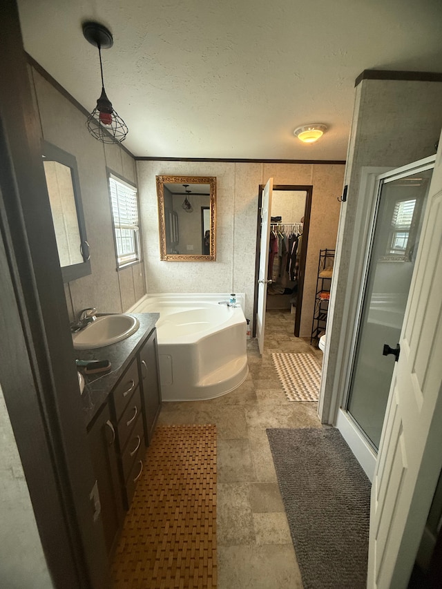 49407 Au Lac Dr E, Chesterfield, MI 48051 - bathroom featuring vanity, a stall shower, a textured ceiling, stone finish floor, and a bath