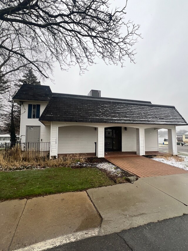 49407 Au Lac Dr E, Chesterfield, MI 48051 - view of front of house with a front yard