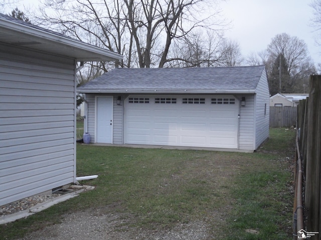 detached garage with fence