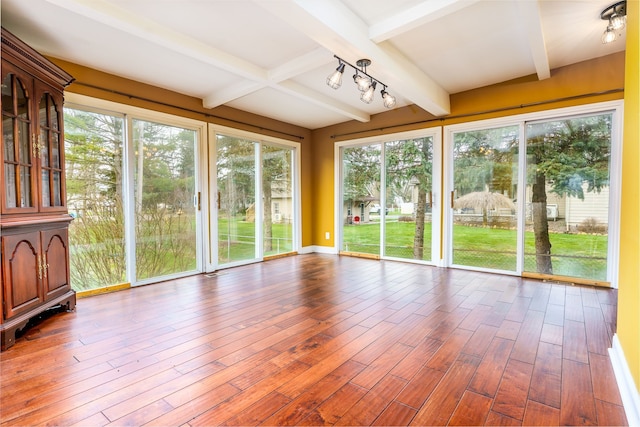 33 N Church St, Ortonville, MI 48462 - unfurnished sunroom featuring beam ceiling and wood finished floors