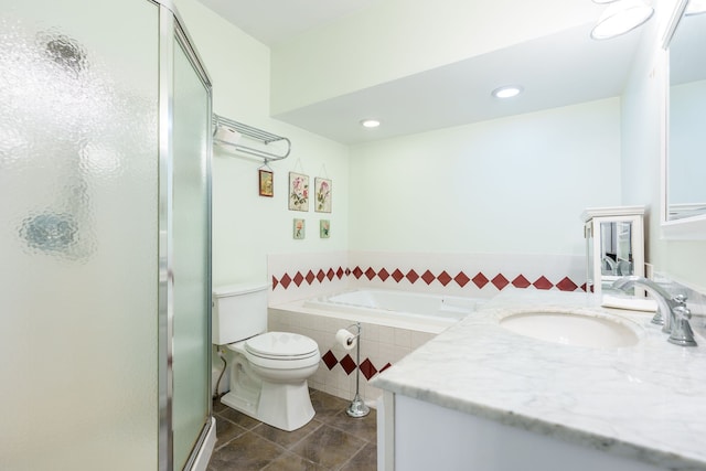 33 N Church St, Ortonville, MI 48462 - full bath featuring tile patterned floors, toilet, vanity, a stall shower, and tiled tub