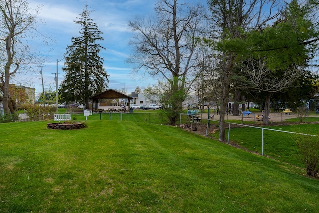 33 N Church St, Ortonville, MI 48462 - view of yard featuring a gazebo and fence