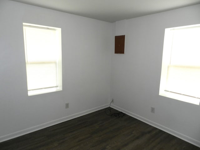 1187 Villa Ct, Benton Harbor, MI 49022 - empty room with baseboards and dark wood finished floors