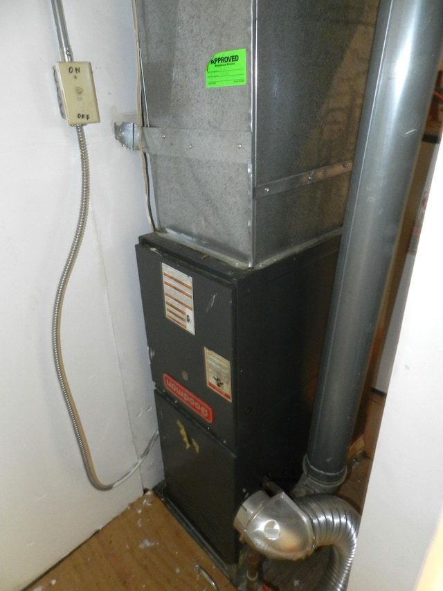 1187 Villa Ct, Benton Harbor, MI 49022 - utility room with heating unit