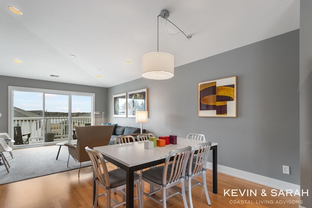 201C Outlook Dr Unit 8, Douglas, MI 49406 - dining room featuring recessed lighting, visible vents, baseboards, and wood finished floors