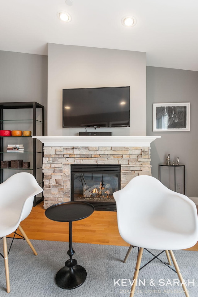 201C Outlook Dr Unit 8, Douglas, MI 49406 - living area with recessed lighting, a stone fireplace, and wood finished floors
