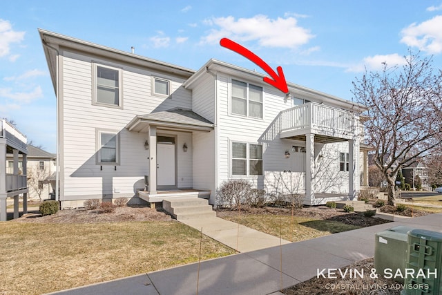 201C Outlook Dr Unit 8, Douglas, MI 49406 - view of property featuring a front lawn and a balcony