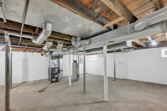 below grade area with heating unit and gas water heater
