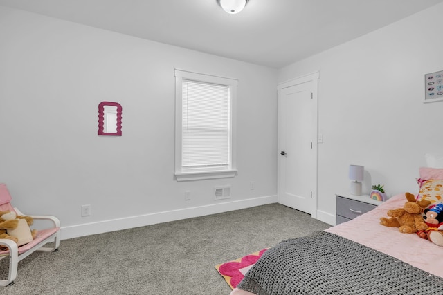 carpeted bedroom with baseboards and visible vents