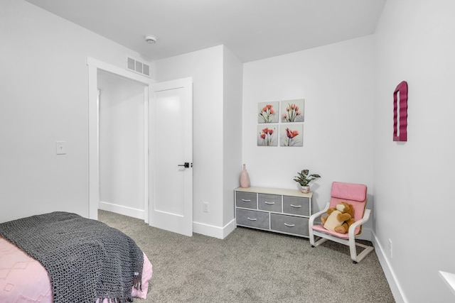 bedroom featuring carpet, visible vents, and baseboards