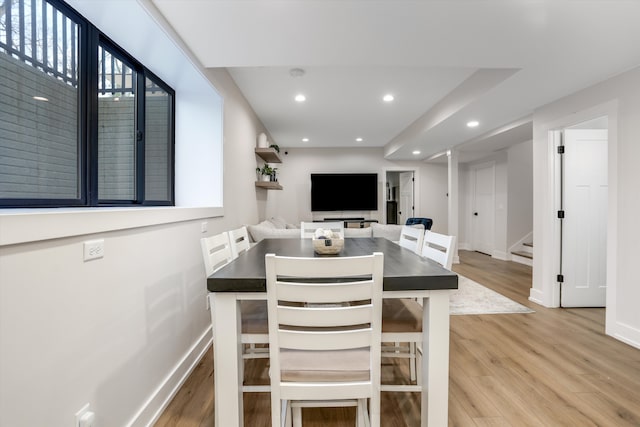 21907 Westcroft Dr, Grosse Ile, MI 48138 - dining room featuring light wood finished floors, baseboards, stairway, and recessed lighting