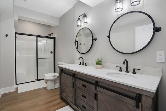 21907 Westcroft Dr, Grosse Ile, MI 48138 - full bathroom with a sink, toilet, a shower stall, and wood finished floors
