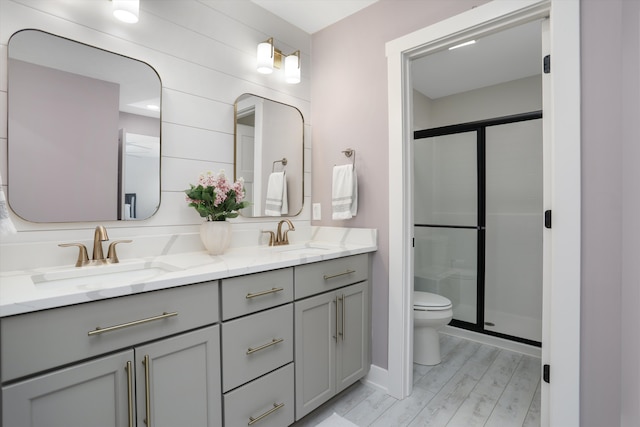 21907 Westcroft Dr, Grosse Ile, MI 48138 - full bathroom with toilet, double vanity, a sink, and a stall shower