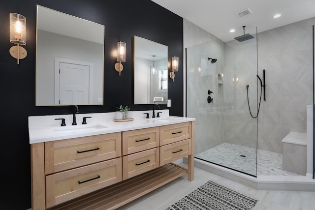 21907 Westcroft Dr, Grosse Ile, MI 48138 - bathroom featuring a walk in shower, double vanity, visible vents, and a sink