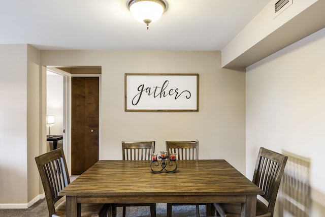 dining room with baseboards