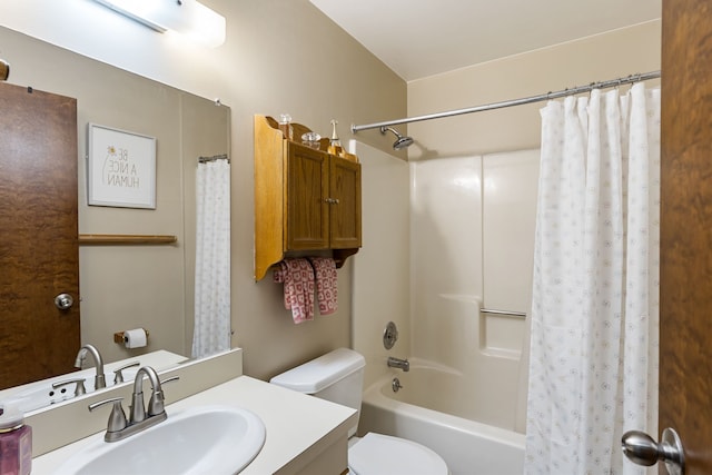 full bathroom featuring toilet, vanity, and shower / bath combo