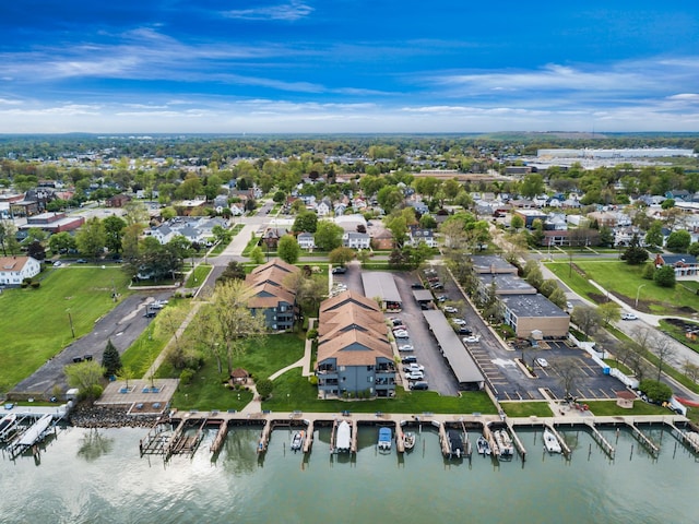 aerial view of property's location featuring a large body of water