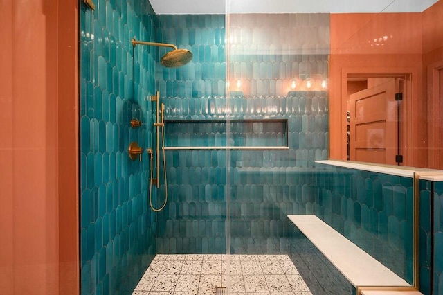 full bathroom with a tile shower