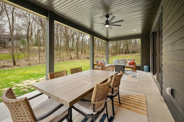 view of patio / terrace with outdoor dining space and ceiling fan