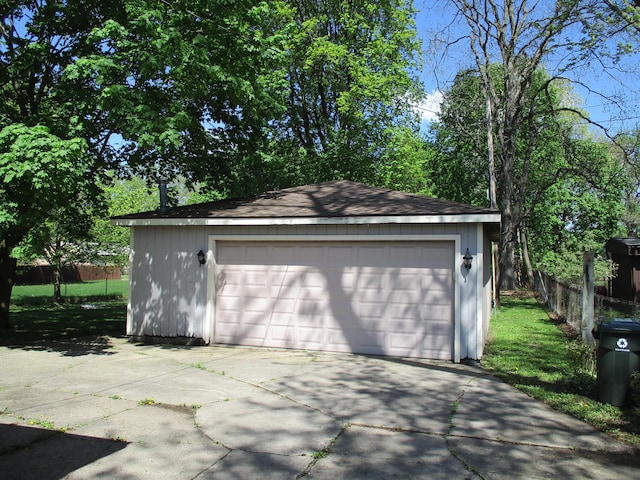 121 Wilkinson St, Chelsea, MI 48118 - detached garage featuring fence